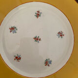 Flowered stamped dessert plates and matching ones.