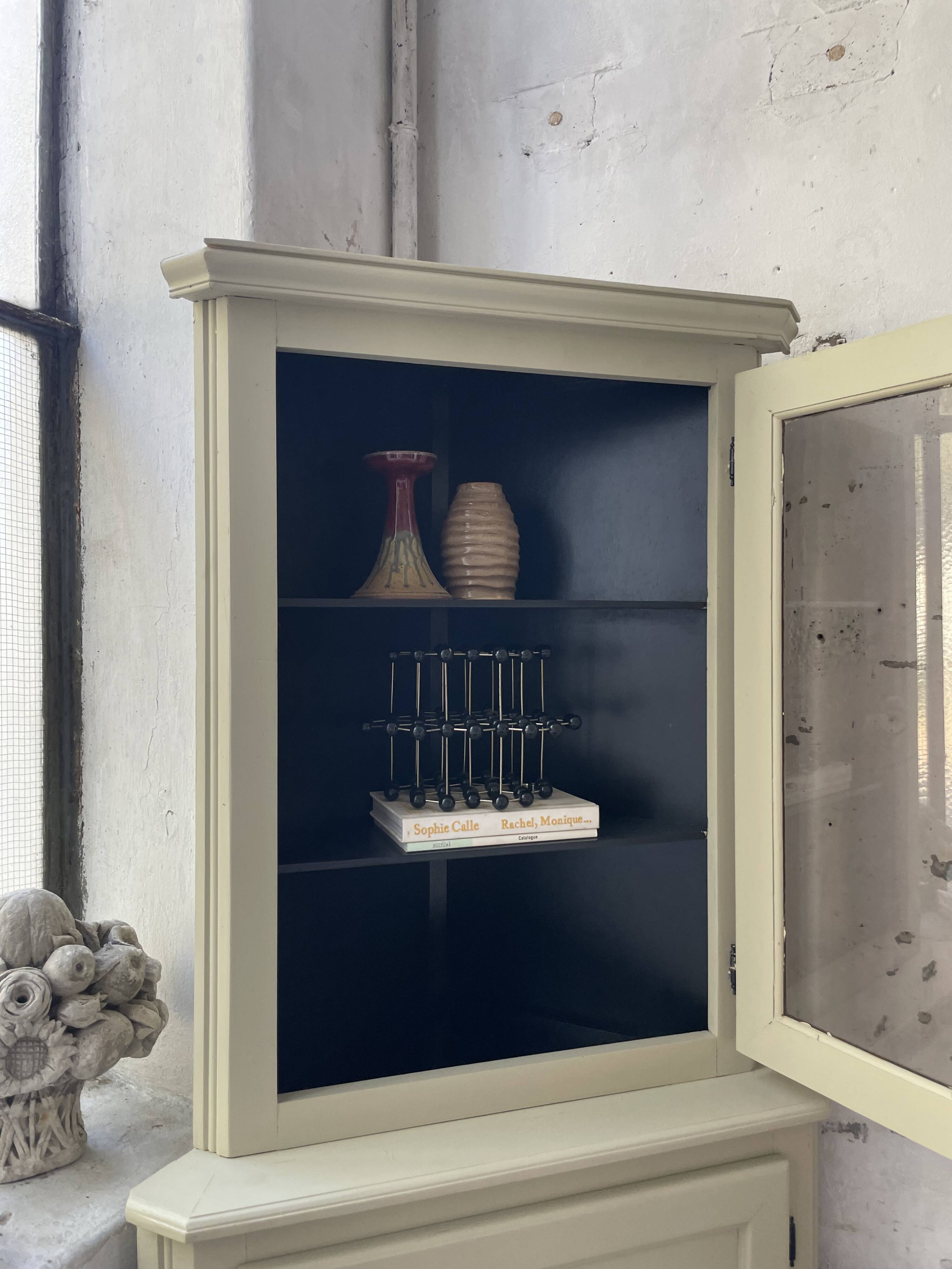 Corner display cabinet from the 1950s