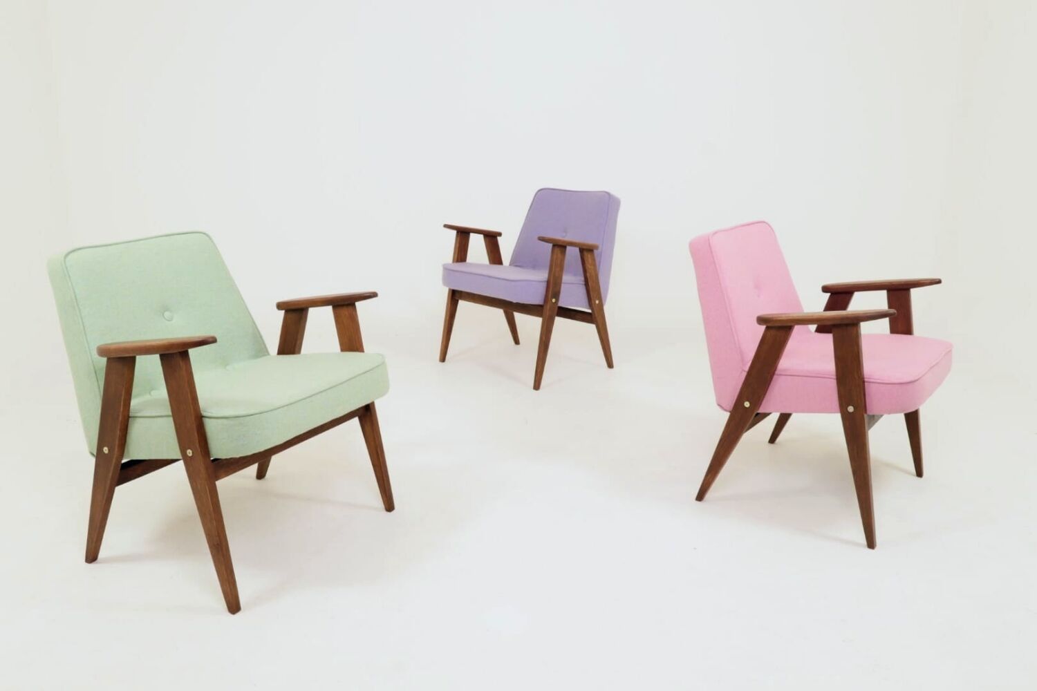 Pastel pistachio wool fabric Scandinavian armchair, oak wood.