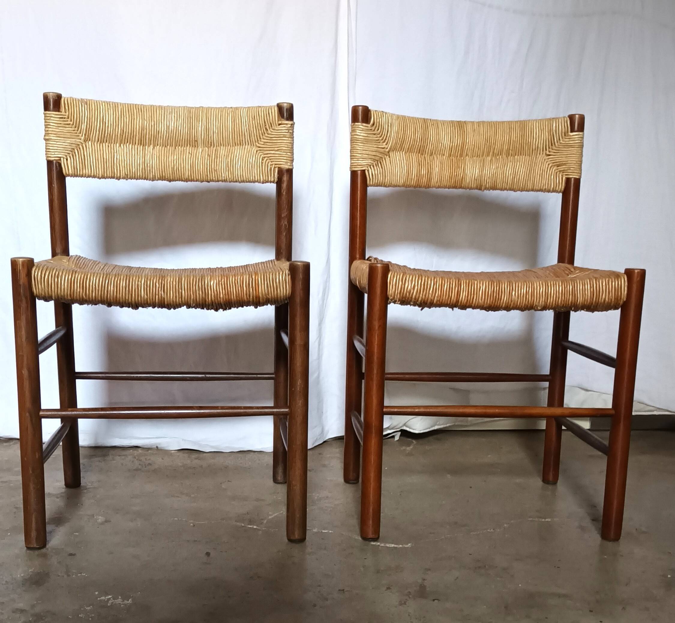 Pair of "Dordogne" chairs by Charlotte Perriand from the 1950s.