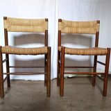 Pair of "Dordogne" chairs by Charlotte Perriand from the 1950s.