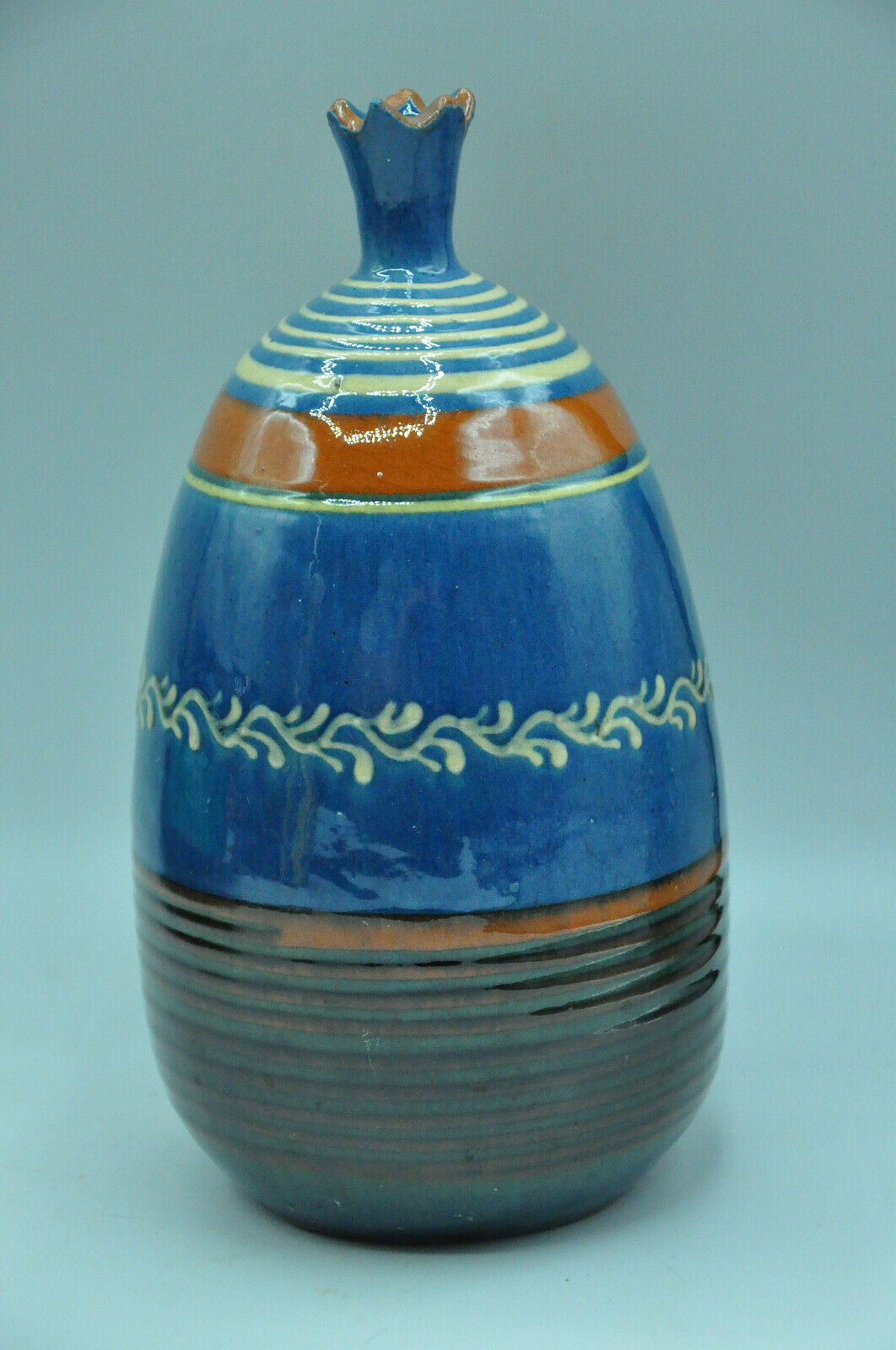 Signed terracotta vase to be identified