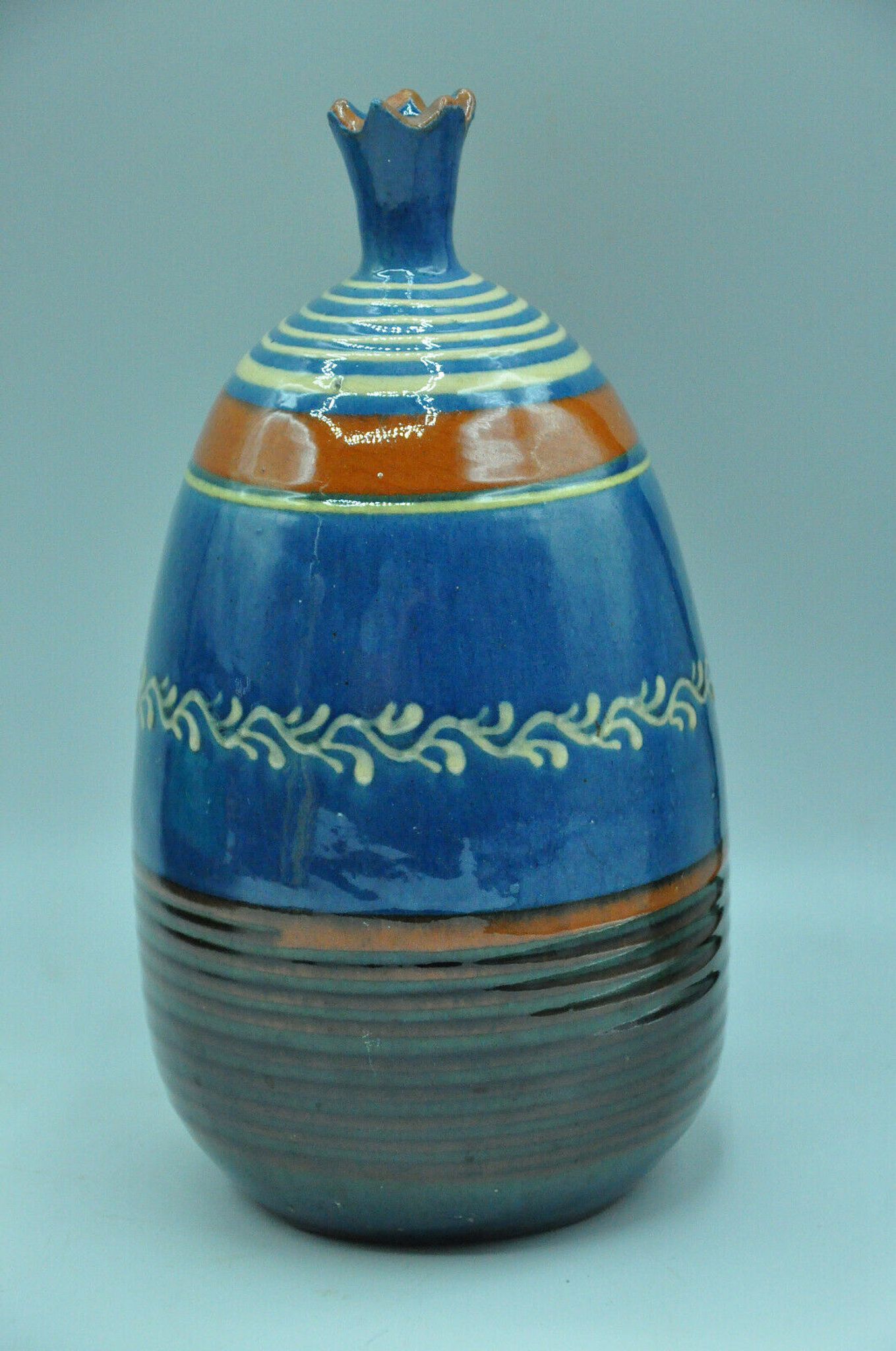 Signed terracotta vase to be identified