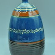 Signed terracotta vase to be identified