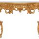 Console with a gilded wooden mirror.