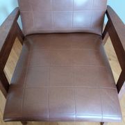 Scandinavian brown skai and wood armchair