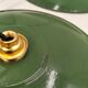 Suspensions in enamelled sheets