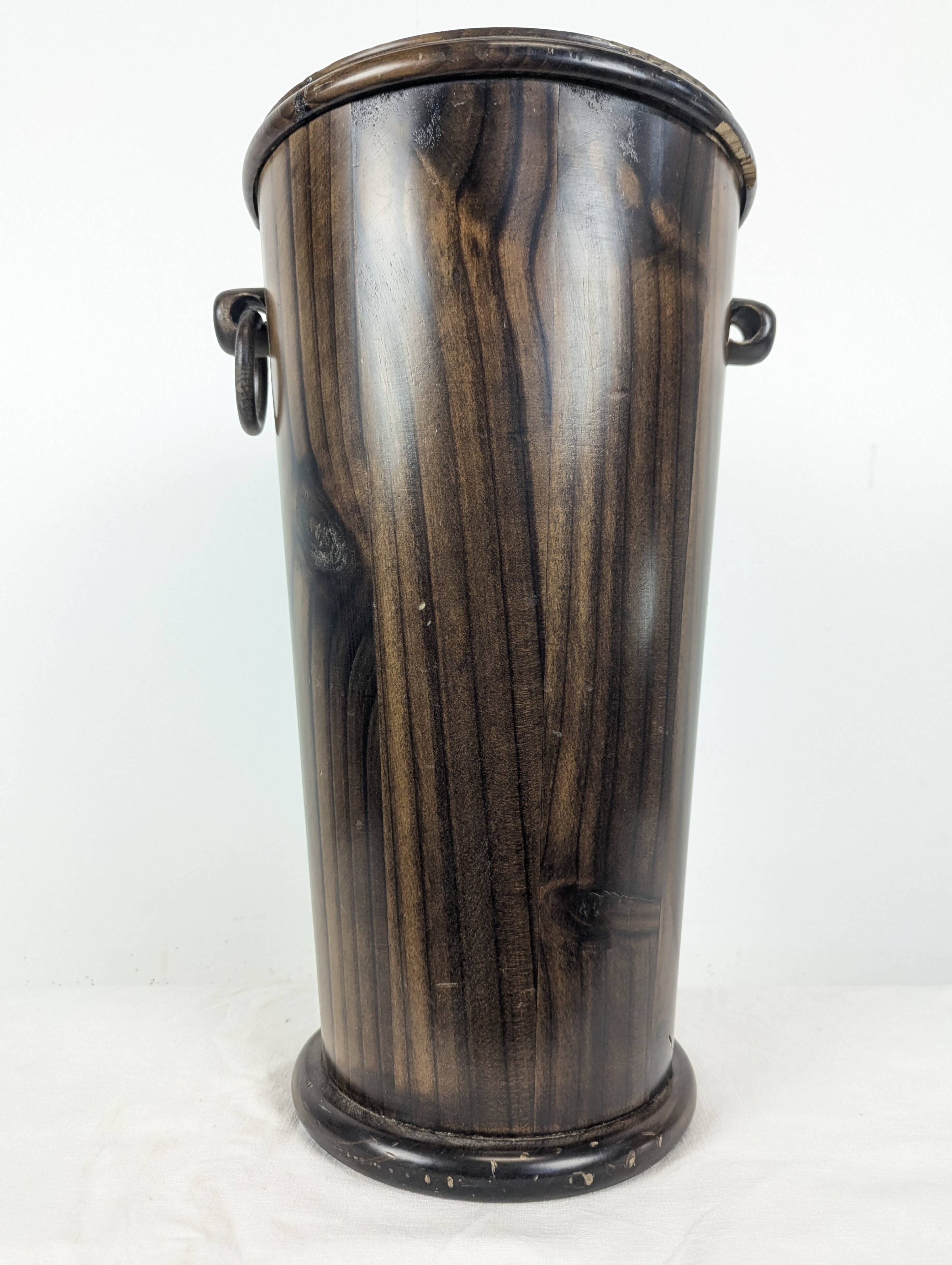 Wooden umbrella stand turned and patinated with iron rings
