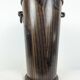 Wooden umbrella stand turned and patinated with iron rings