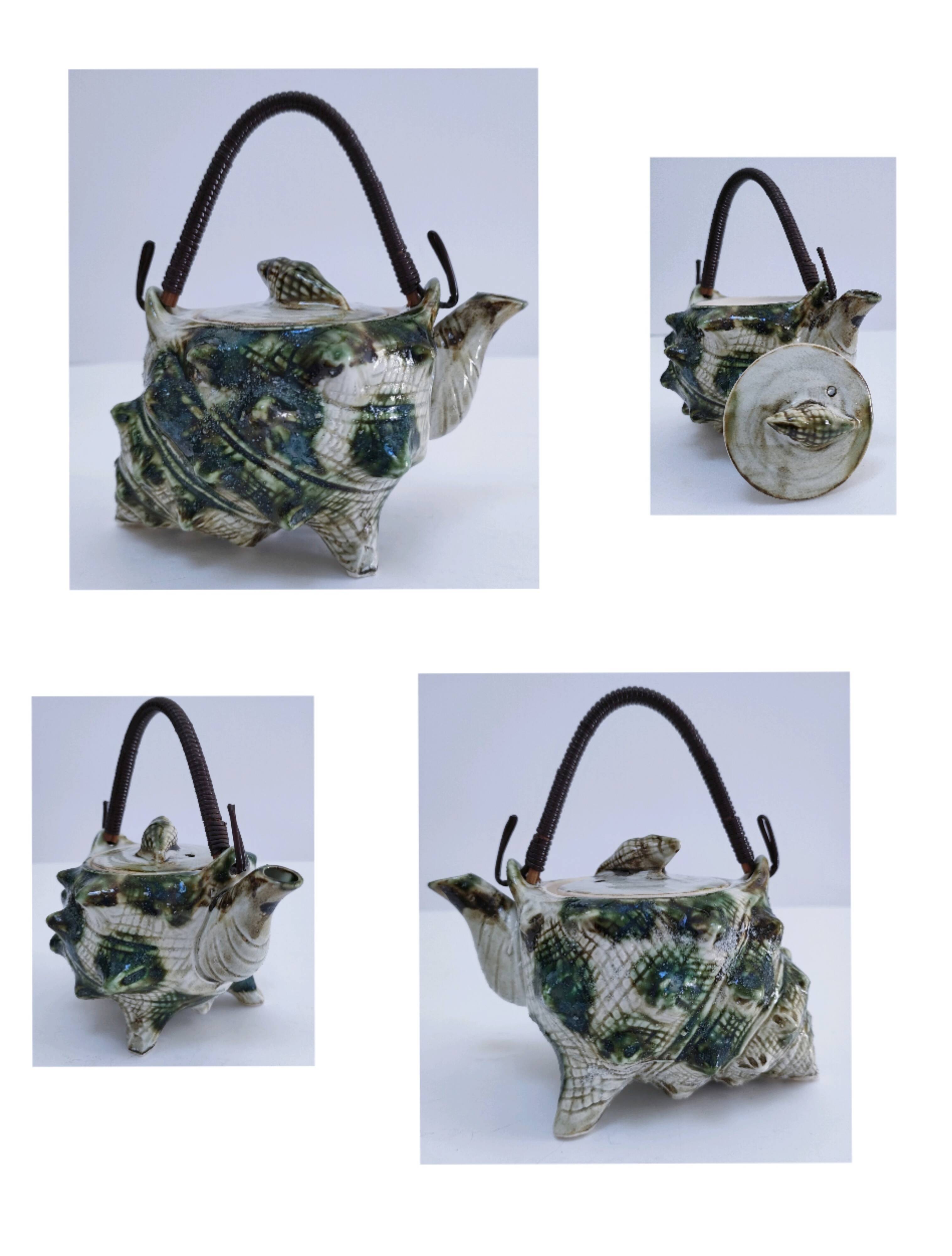 Vintage enamelled earthenware shell decor teapot