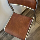 4 chrome chairs in faux leather