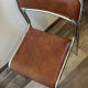 4 chrome chairs in faux leather