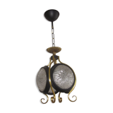 Suspension of years 50-60 in glass and metal