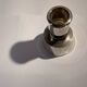 Metal candlestick by Jens Quistgaard for the brand Dansk Designs.