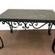 Table basse en fer forgé et marbre XX siècle