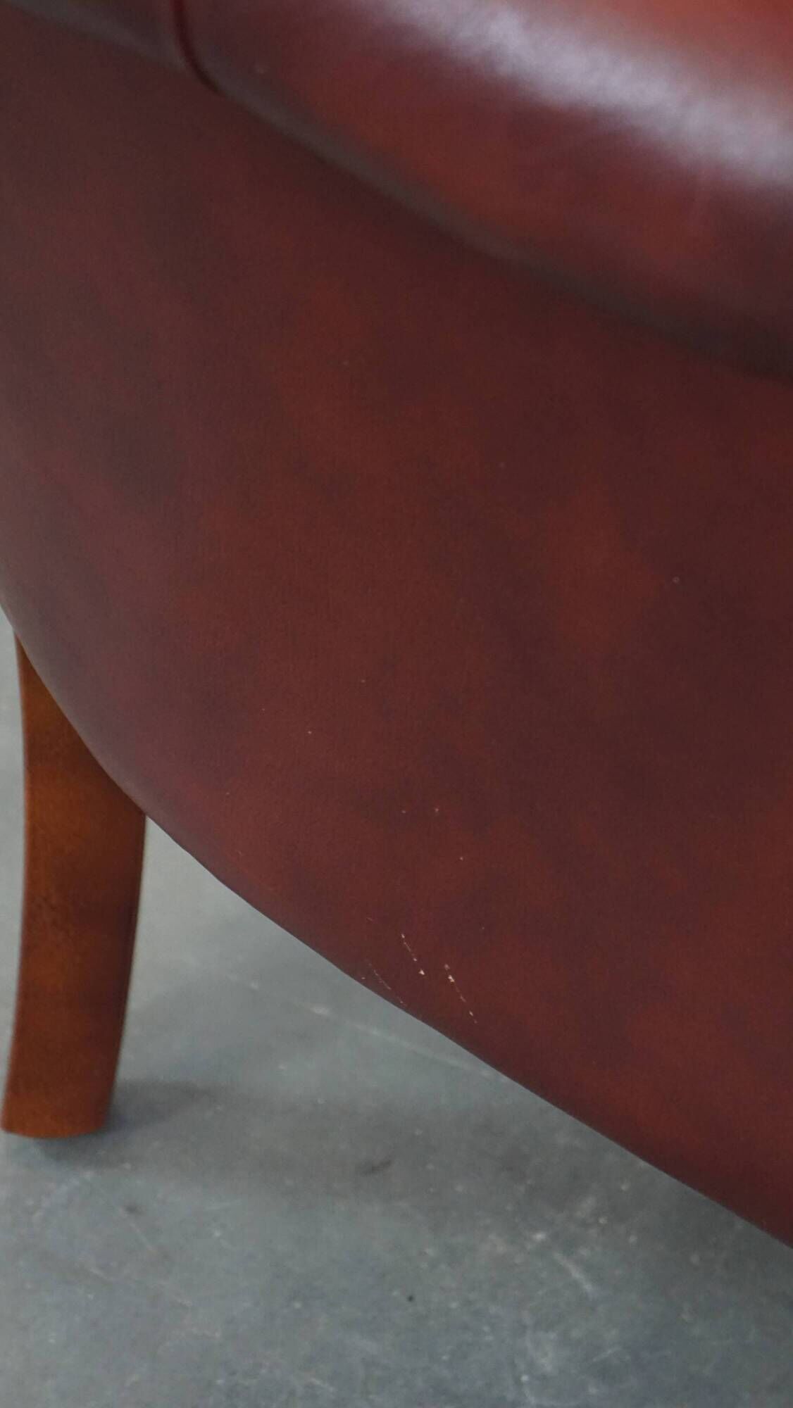 Red cow leather English chesterfield club chair