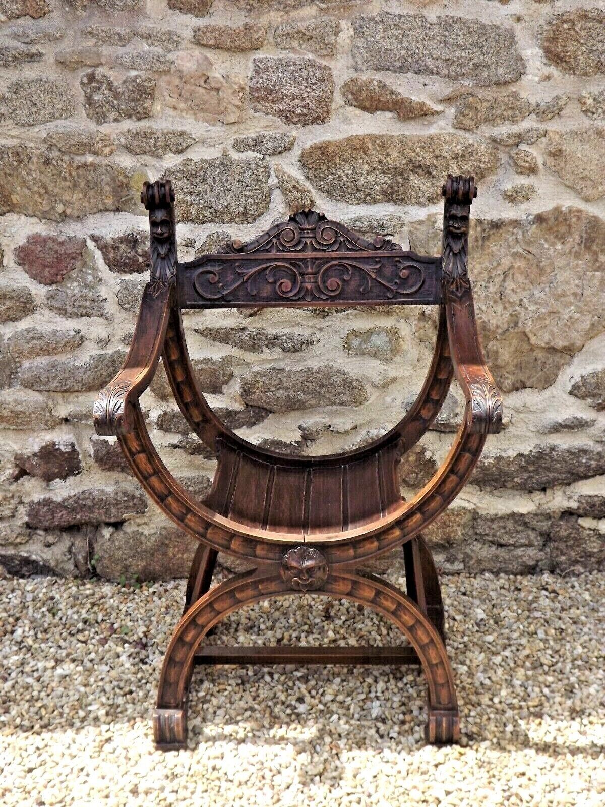 Dagobert armchair curule hard carved walnut demon head detail 3675