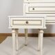 Old white secretary desk with bedside table