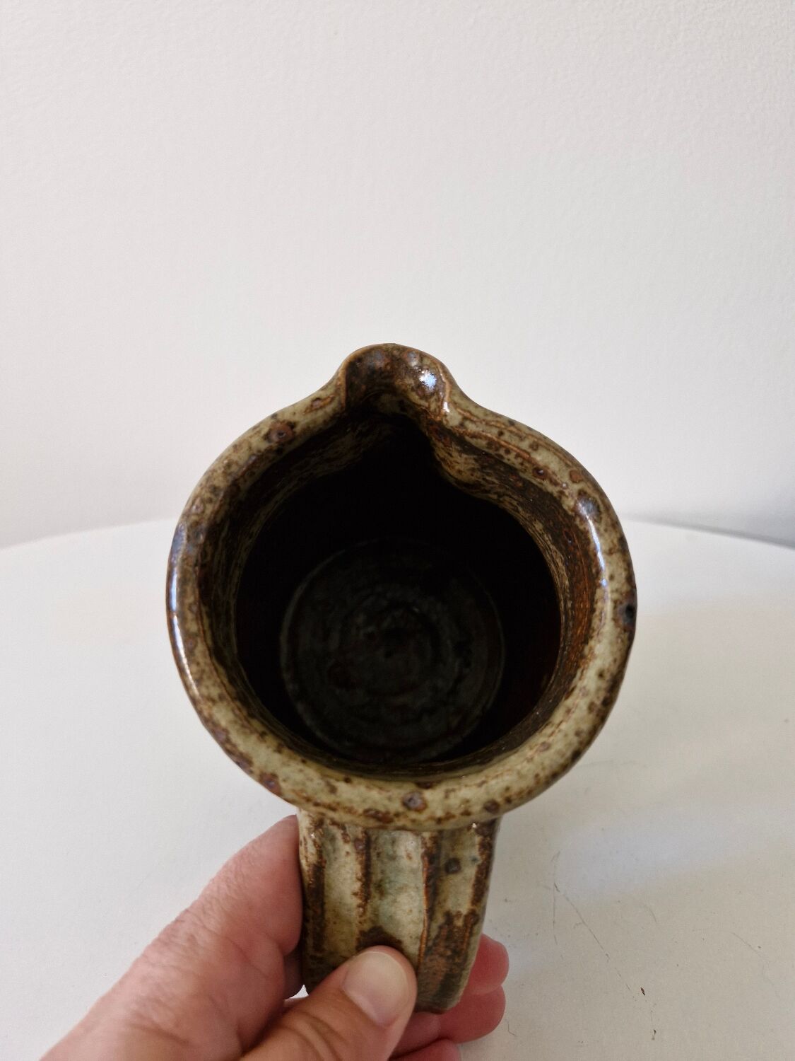 Old pitcher in pyrite stoneware