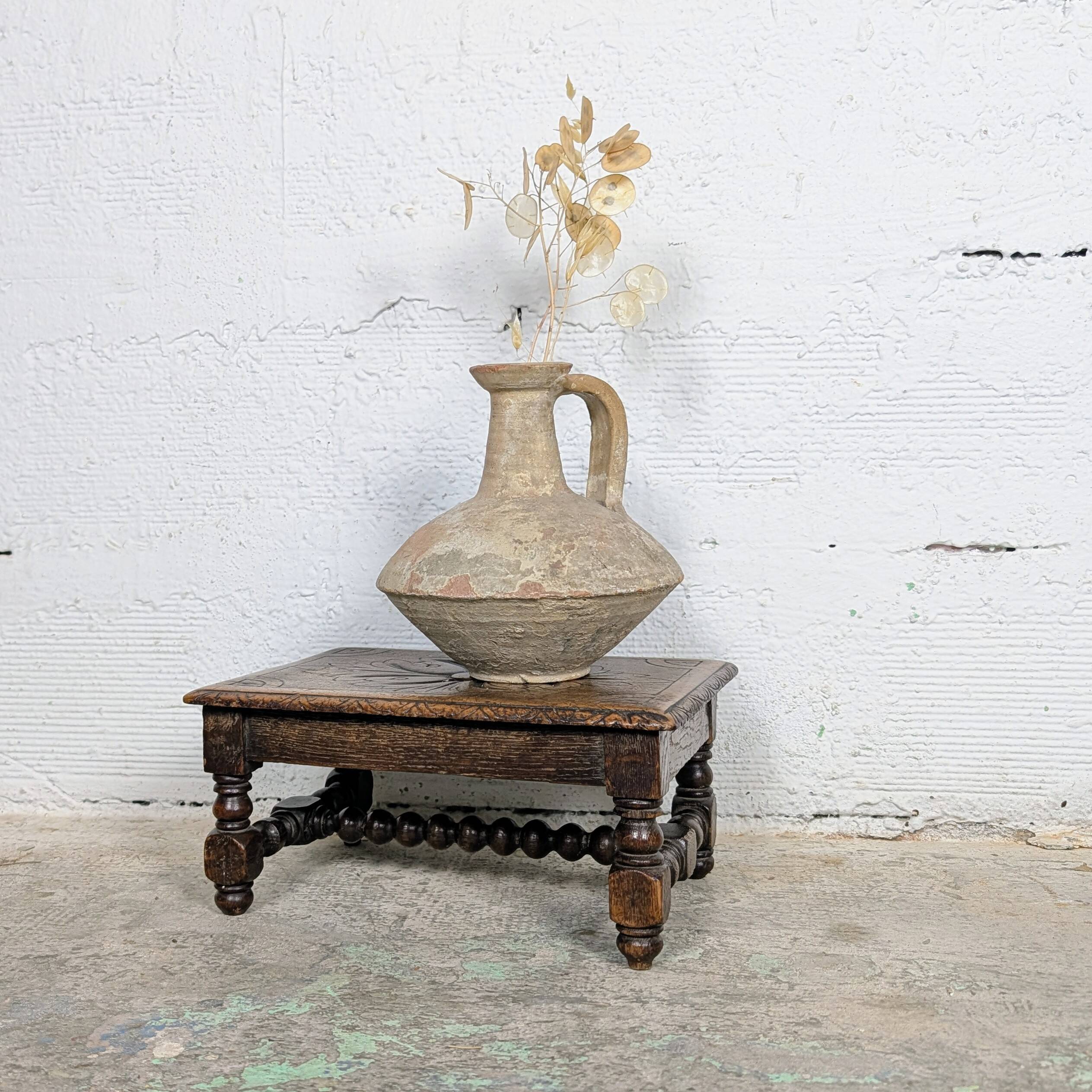 Carved wooden footrest