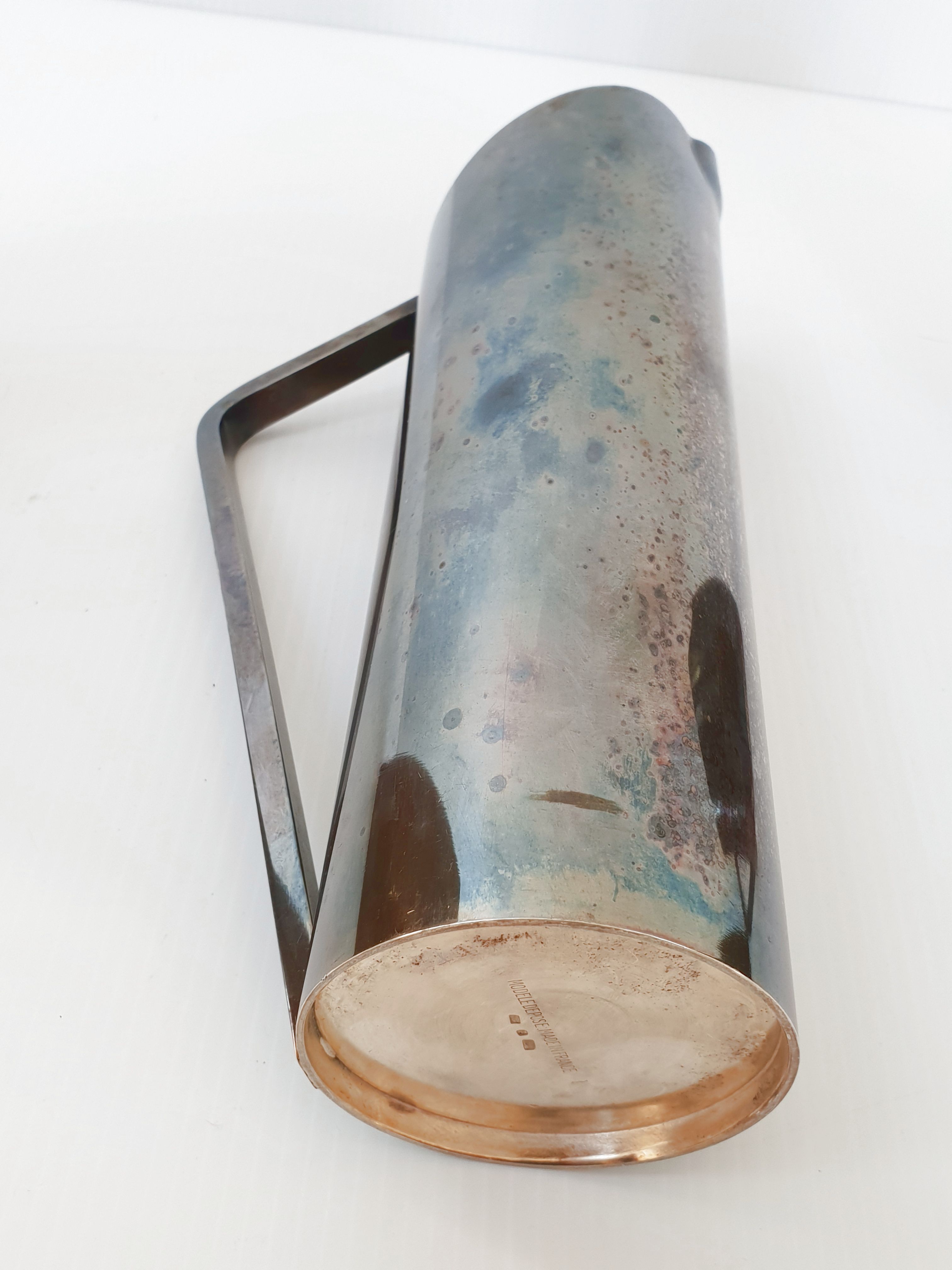 Suite of 3 pitchers in vintage 1970 silver metal