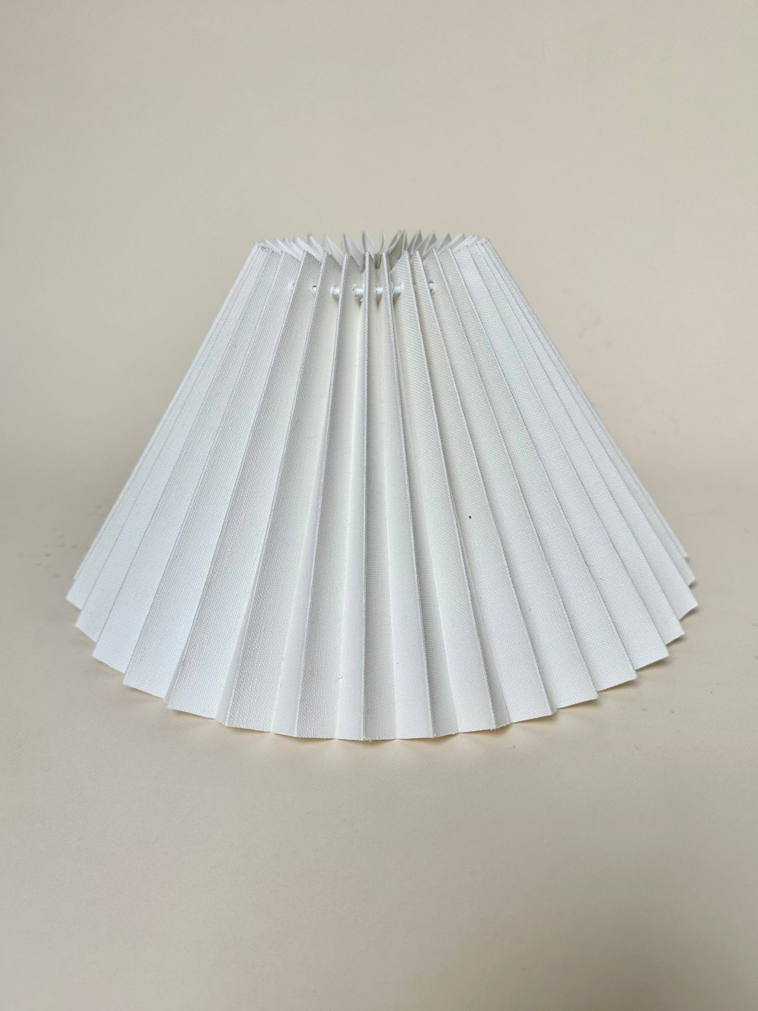 Stone lamp with pleated shade