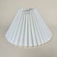 Stone lamp with pleated shade