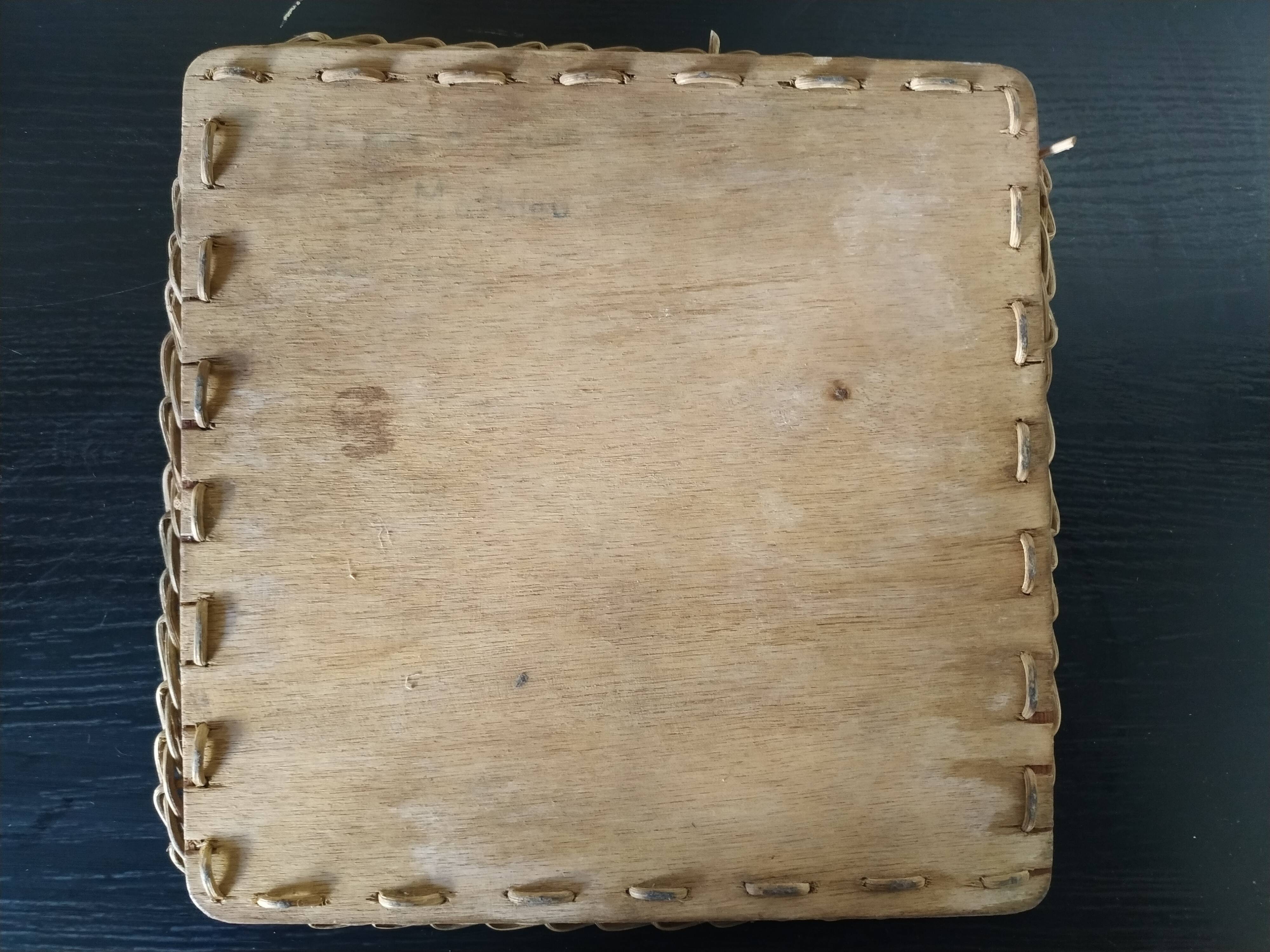 Under ceramic dish and rattan