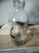 Old graduated glass bottle