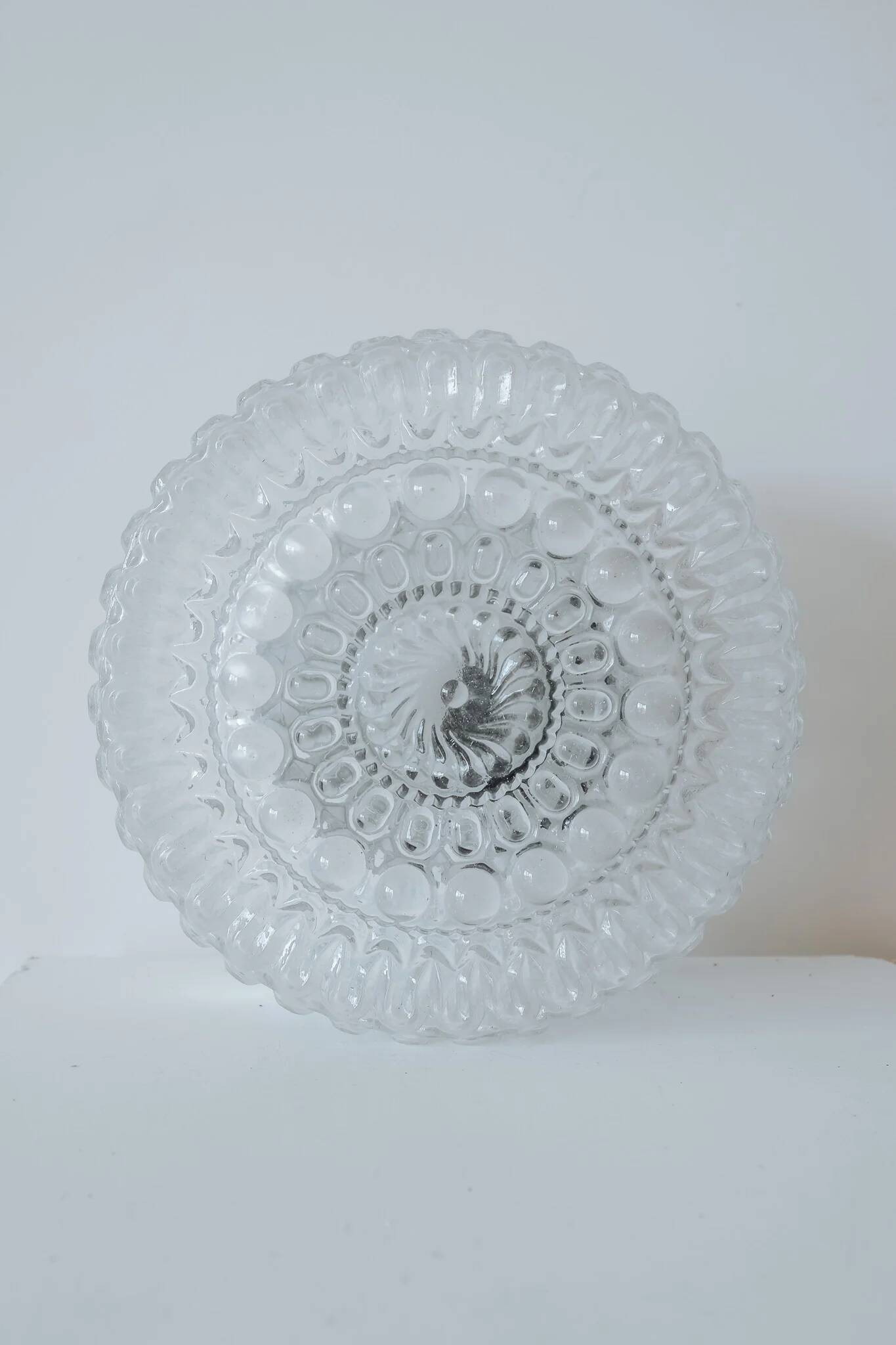 Vintage round ceiling light in bubbled glass, 1970s.