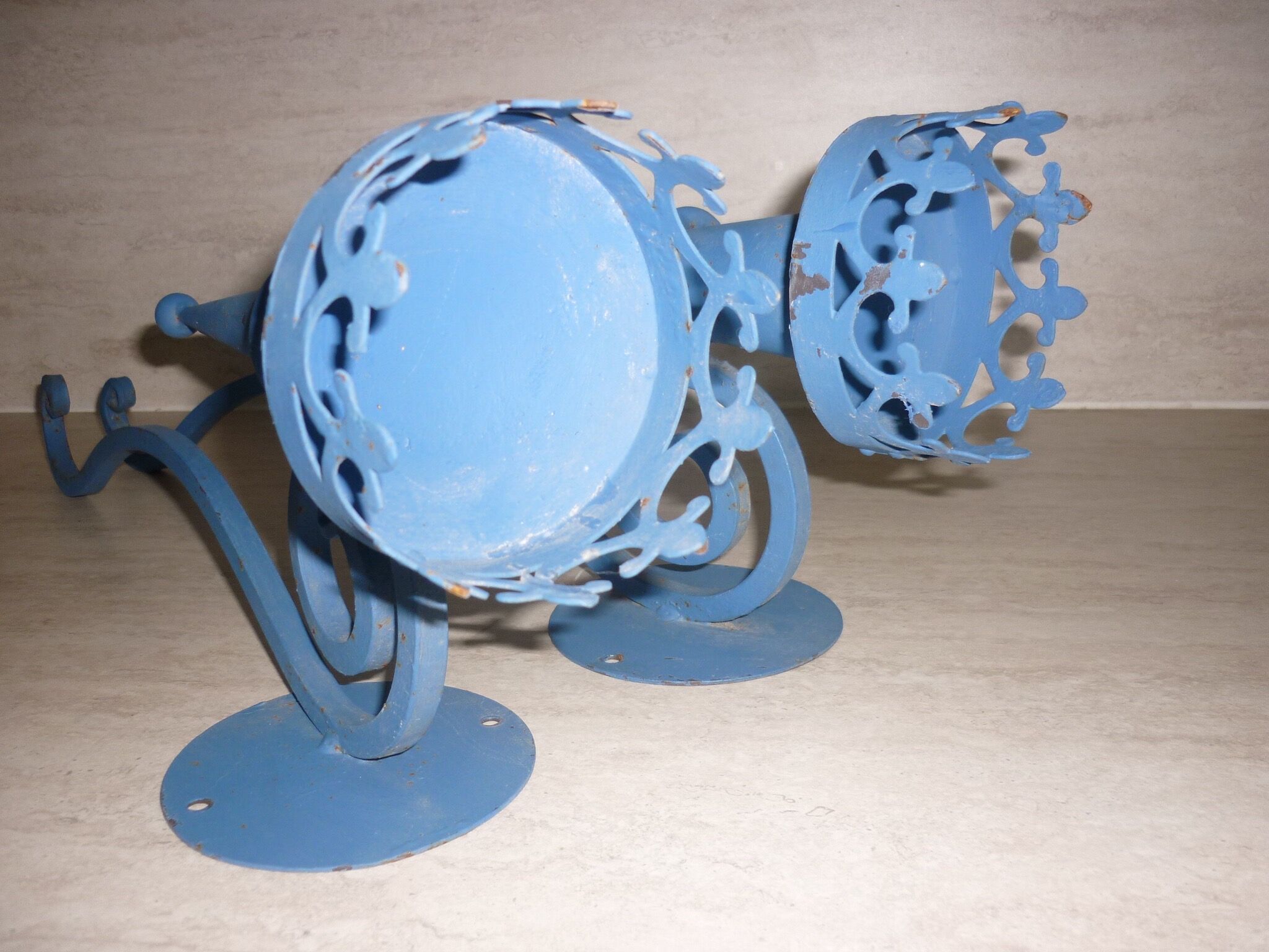 Pair of candle holders, blue torches