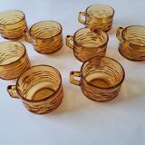 Set of 8 cups and amber glass under cups