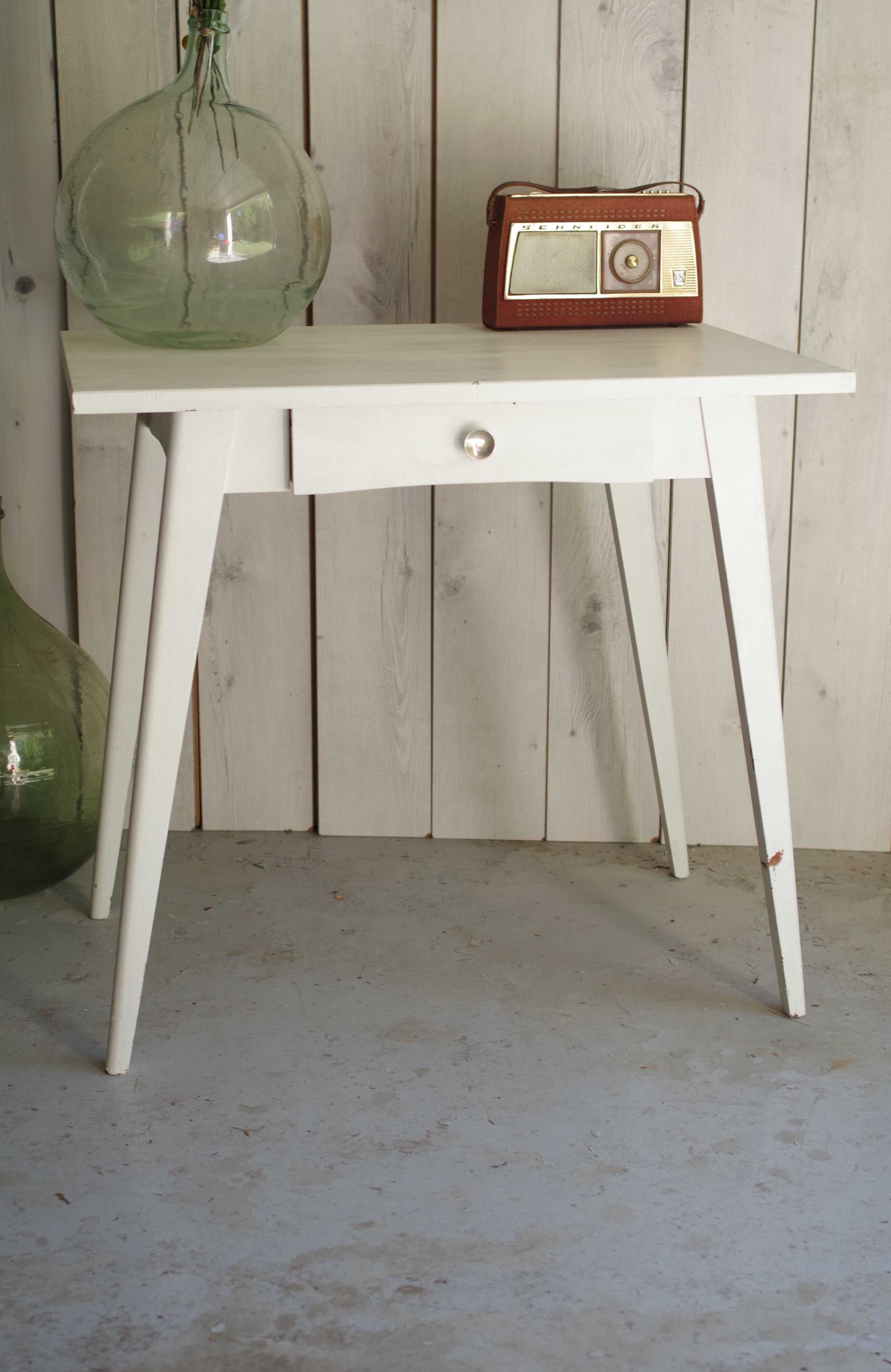White compass feet table