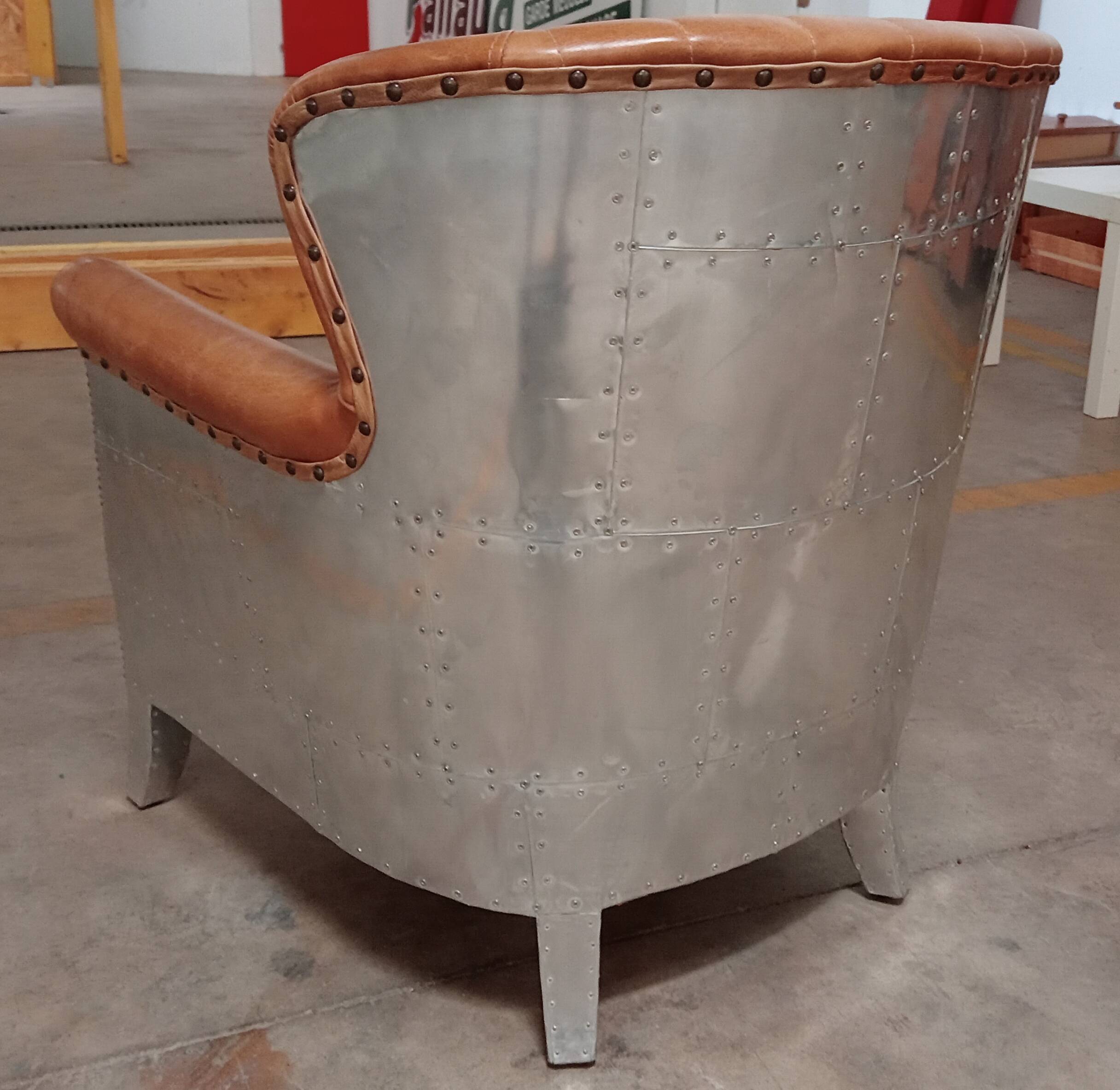 2 aviator armchairs
