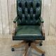 English chesterfield office armchair in green leather from the 1980s