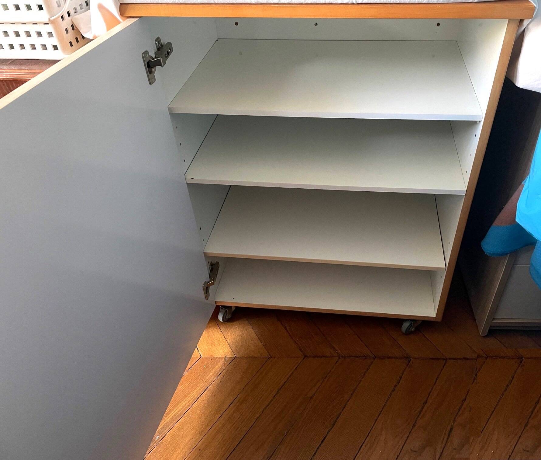 New oak storage furniture with a signed artisanal mosaic top.