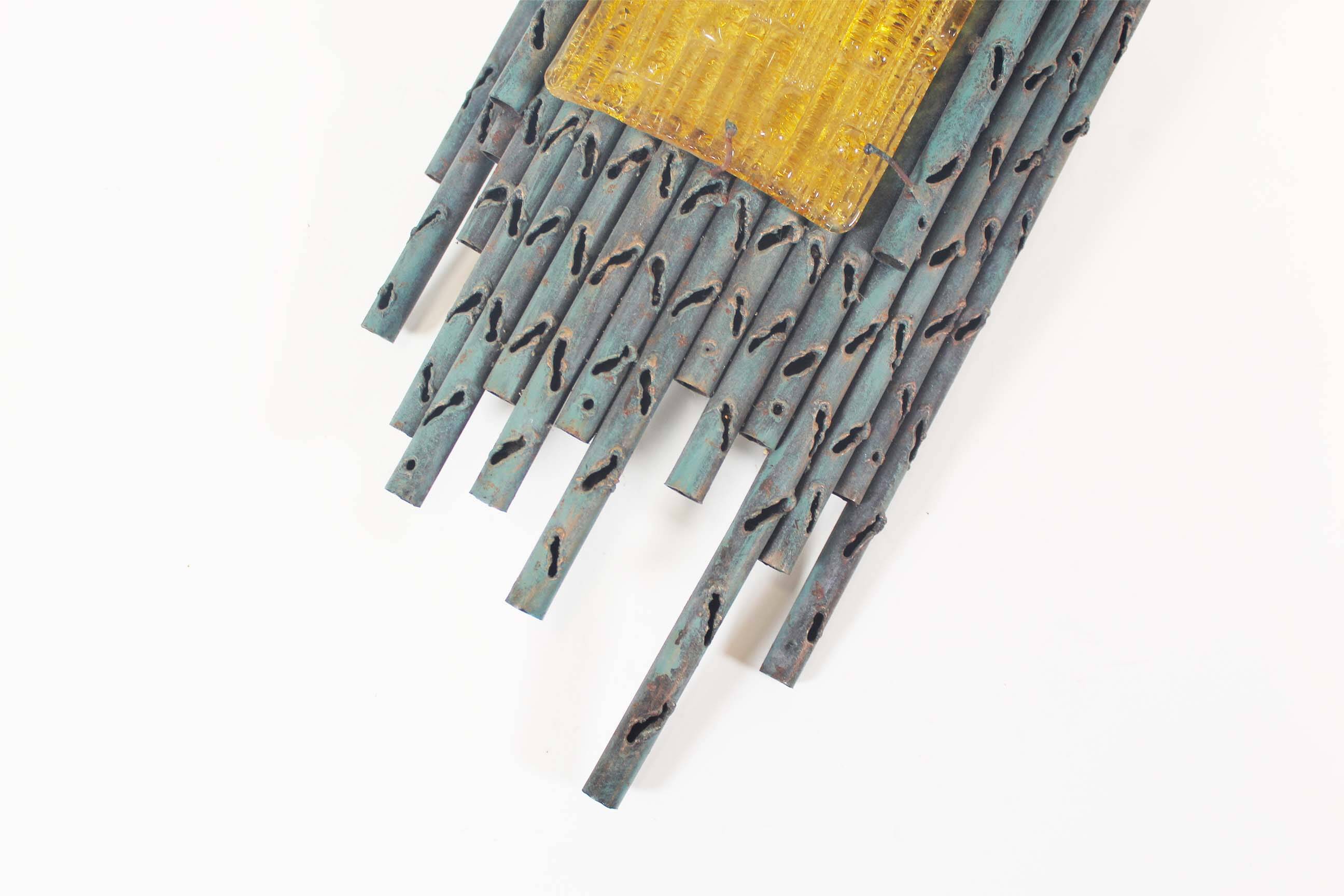 brutalist rough iron and glass wall sconce by Marcello Fantoni