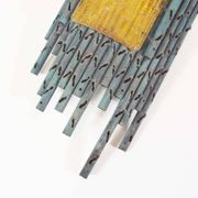 brutalist rough iron and glass wall sconce by Marcello Fantoni