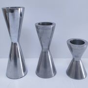 three "diabolo" aluminium design candle holders 90