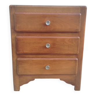 Small bedside table or vintage mini chest of drawers.