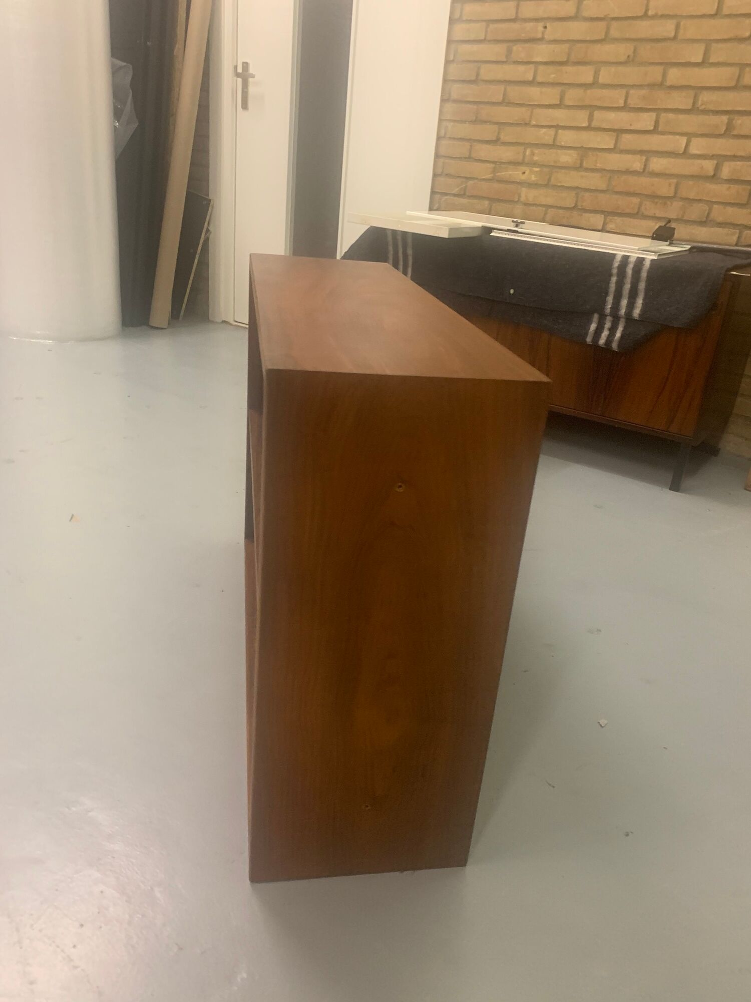 Rosewood bookcase with metal black legs, made in Denmark, 1960s