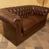 brown leather 2-seater Chesterfield sofa
