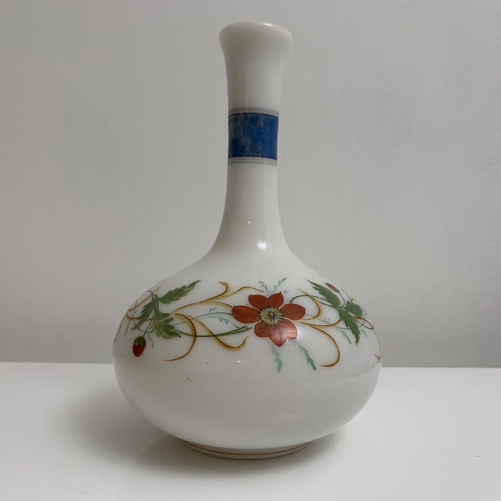 Old vase in opaline floral decoration painted