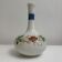 Old vase in opaline floral decoration painted