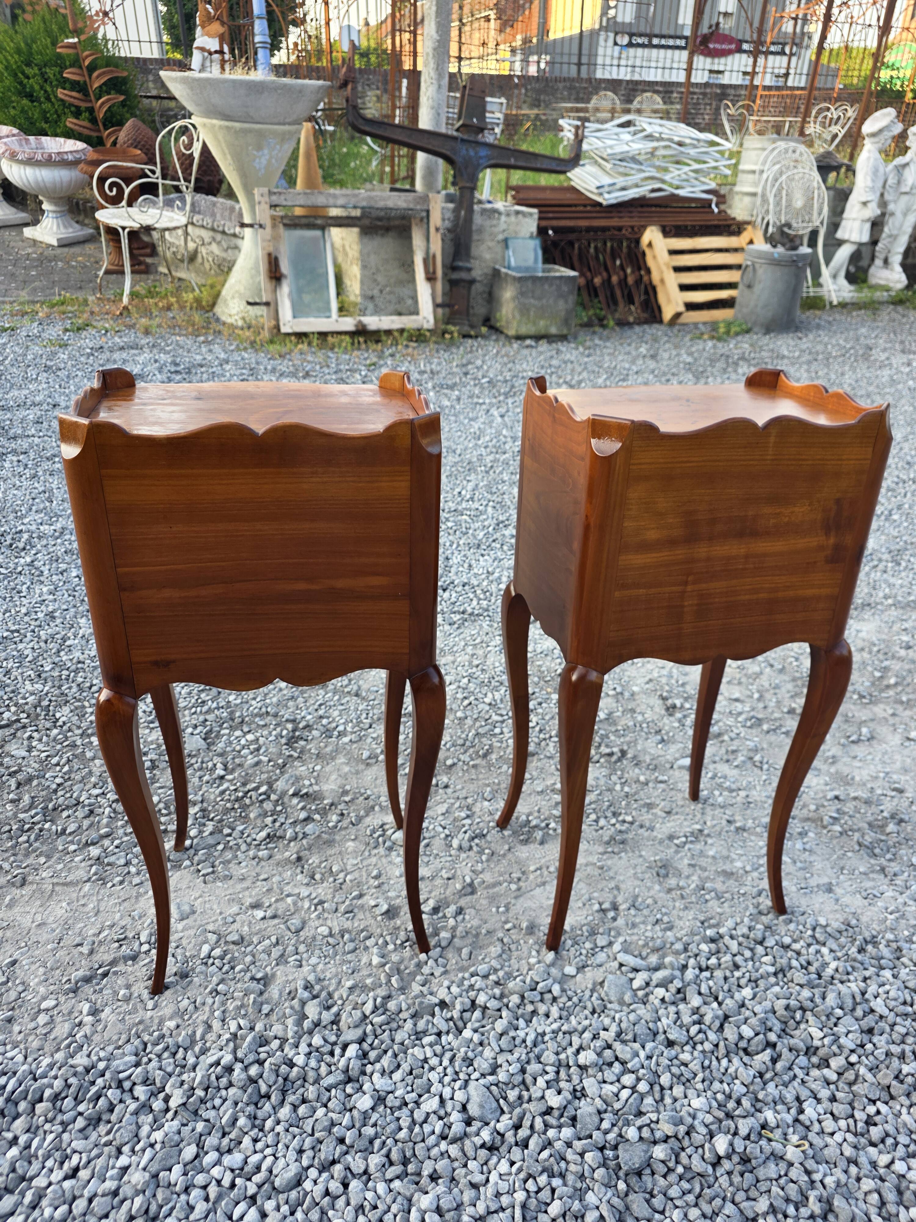 Pair of Louis XV style bedside tables in solid cherry wood.