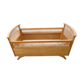 Baby cot in oak and wicker