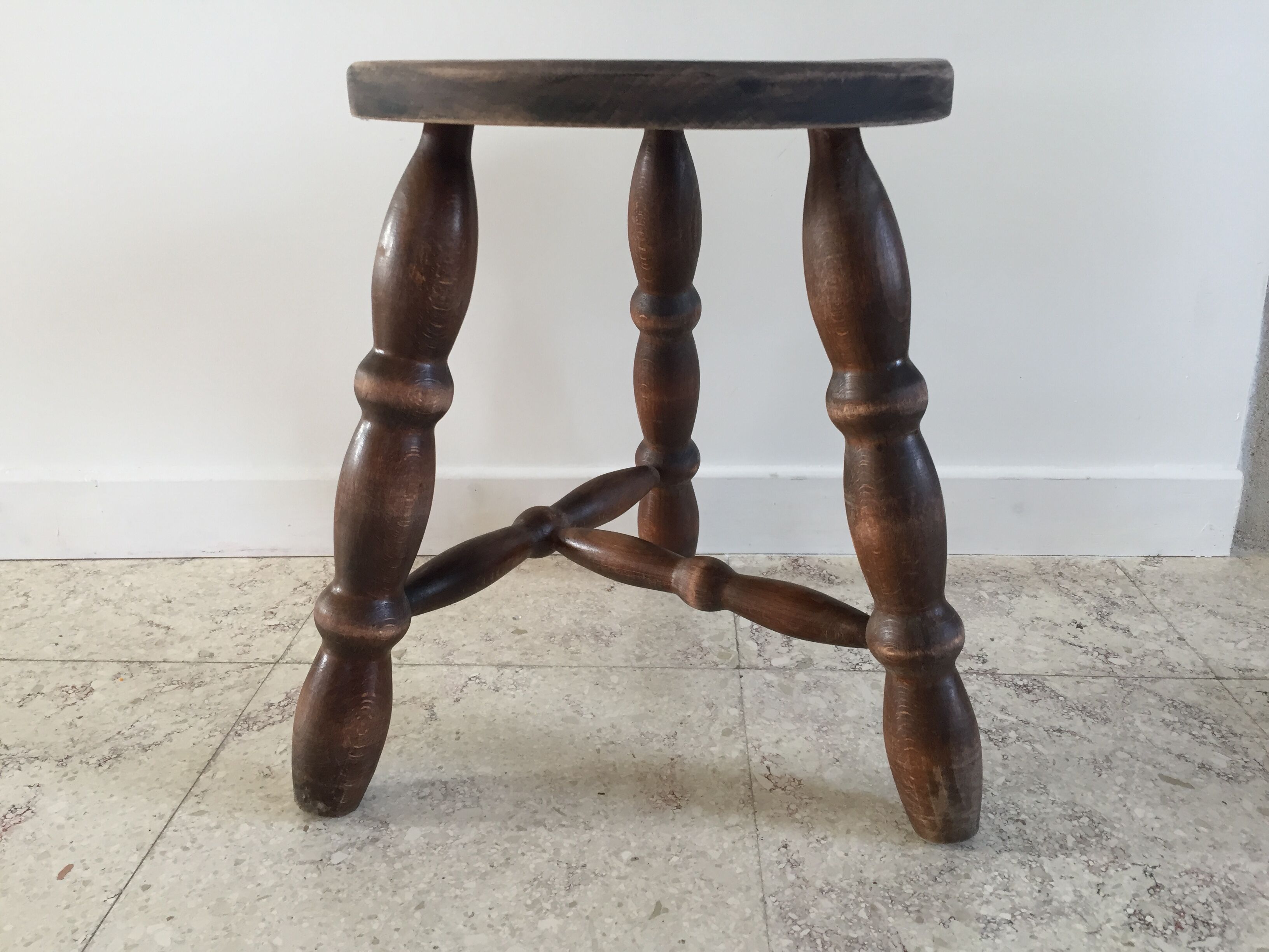 Wooden stool turned vintage tripod