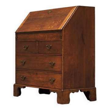 Antique English oak secretary with drop-down front.