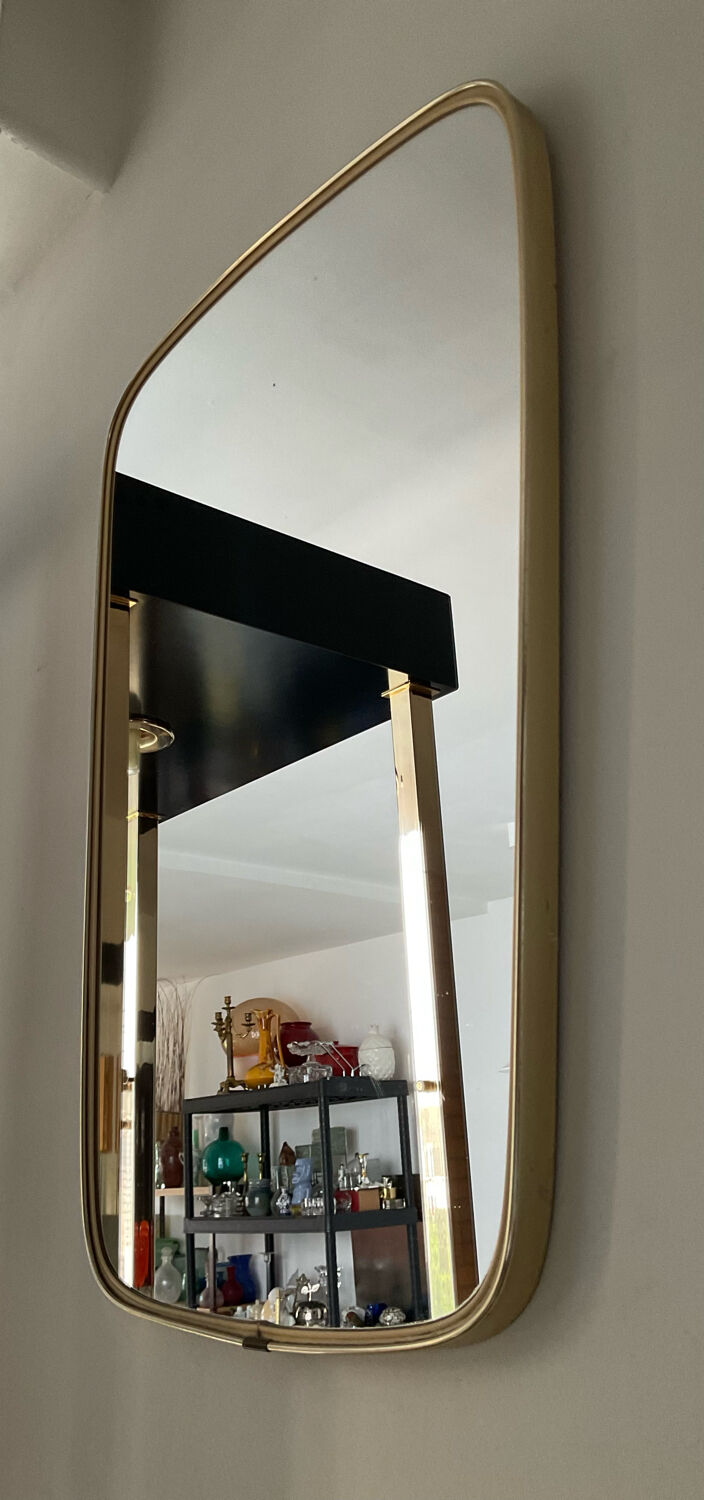 Asymmetrical free-form mirror from the 60s
