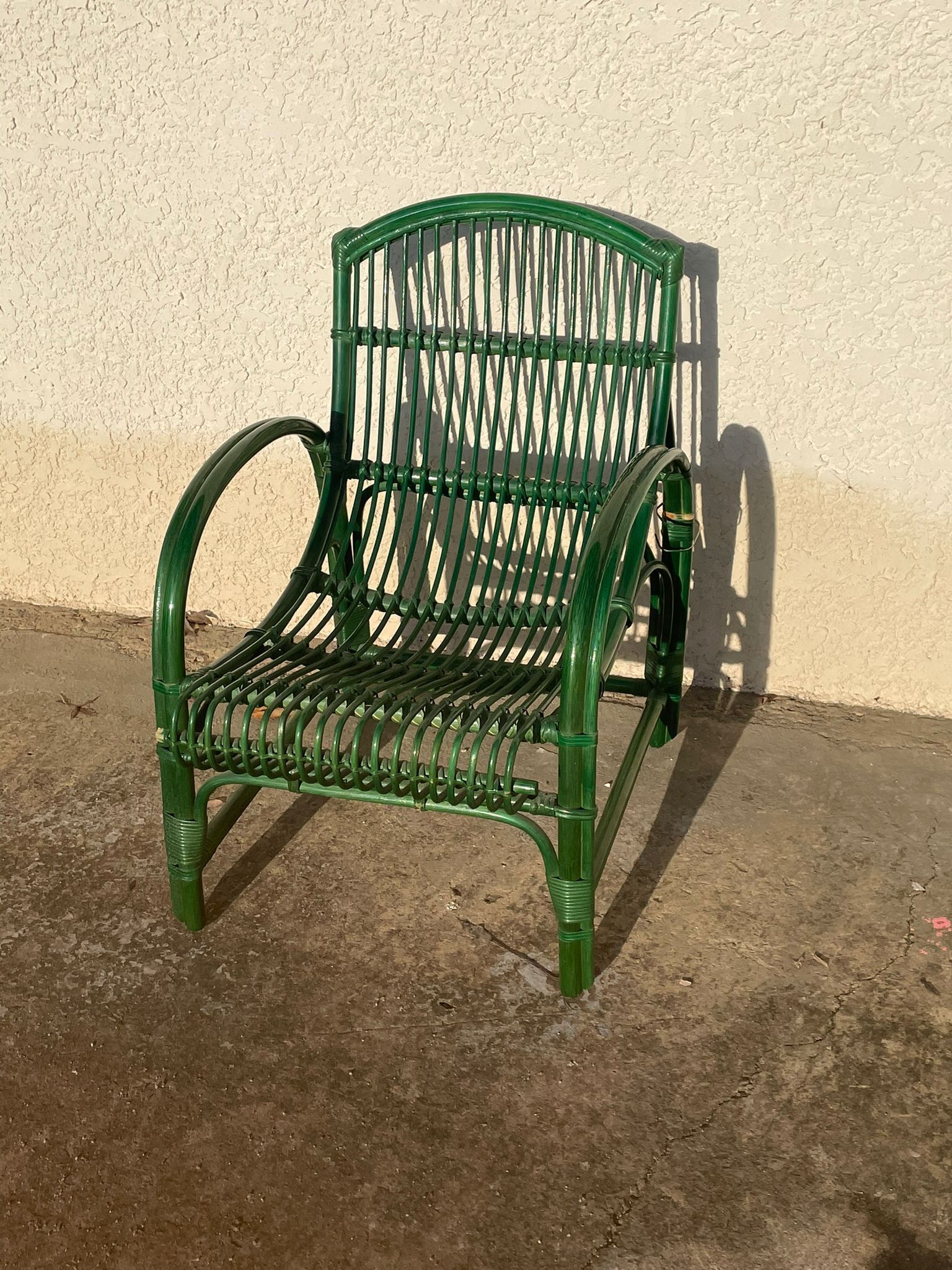 Green rattan armchair
